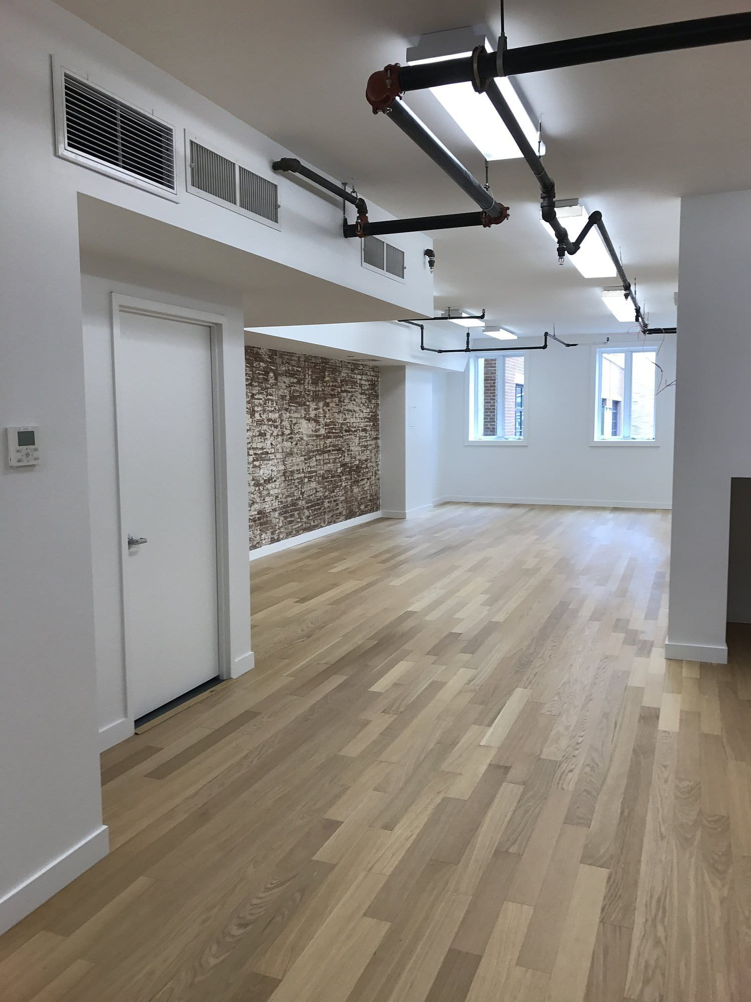 206 Spring Street Office, office interior in Manhattan built by AIK Renovations, New York general contractor (photo 3 of 3)