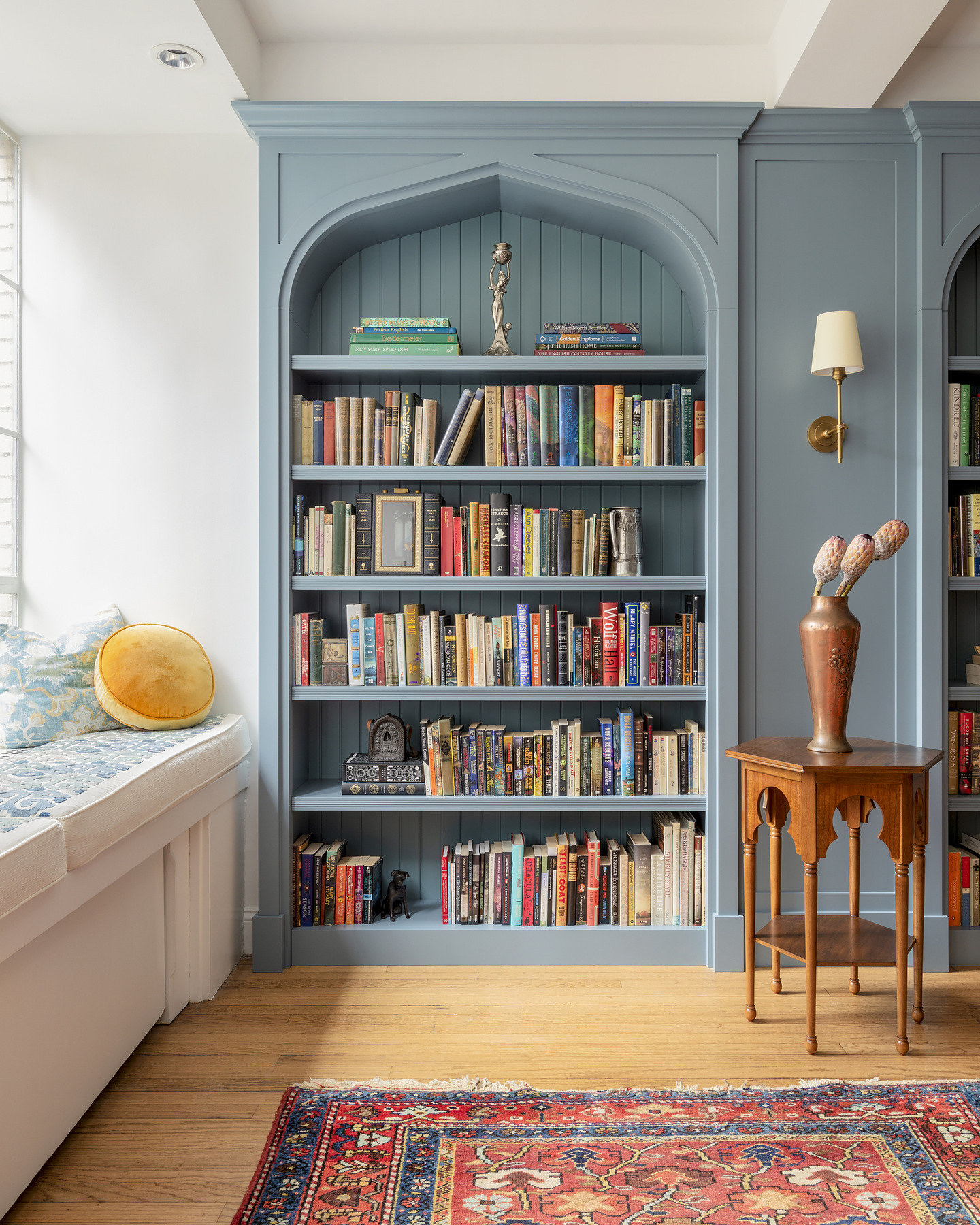 Arched built-in bookcases, Midtown Residence, Manhattan: finish work by AIK Renovations
